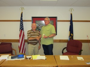Courtesy image of leaving chairman Don Reed (on right) and incoming chairman Bob Riehl (on left) receiving plaque of recognition for the many years of community support and dedication. 