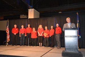 Lockwood School Board members waiting in the background to receive the MSEL's to award of school board o the year. Rick Duncan of the SAM (School Administrators of Montana) President is recognizing all the new things this year that have already happened at Lockwood School.