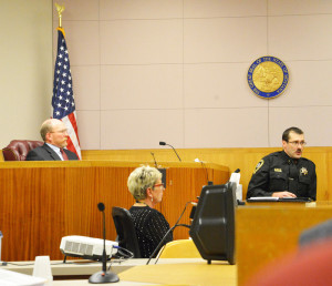 Kevin Evans, undersheriff of the Yellowstone County Sheriff’s department, testifies about officer training on Tuesday during the coroner’s inquest into the shooting death of 28-year-old Loren Simpson. At left is Park County Coroner Al Jenkins, who presided over the inquest. (Judy Killen photo)